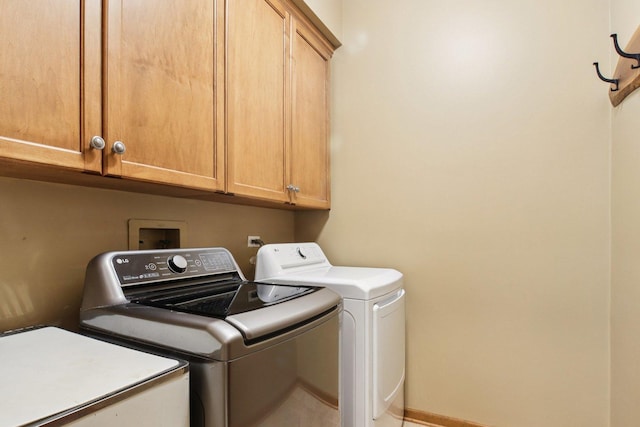 1560 Fairway Cir, Geneva, IL 60134 - washroom with cabinet space and separate washer and dryer
