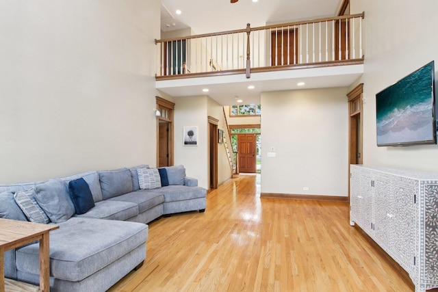 1560 Fairway Cir, Geneva, IL 60134 - living area featuring light wood-type flooring, a towering ceiling, and recessed lighting