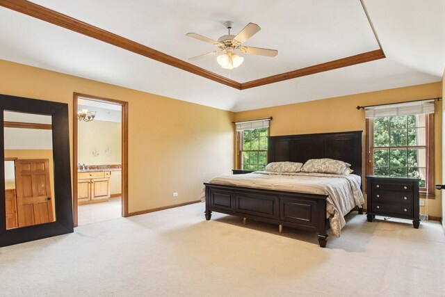 1560 Fairway Cir, Geneva, IL 60134 - bedroom with light colored carpet, a raised ceiling, lofted ceiling, ornamental molding, and connected bathroom