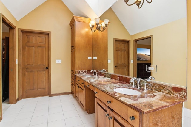 1560 Fairway Cir, Geneva, IL 60134 - bathroom featuring vaulted ceiling, double vanity, tile patterned floors, and a chandelier