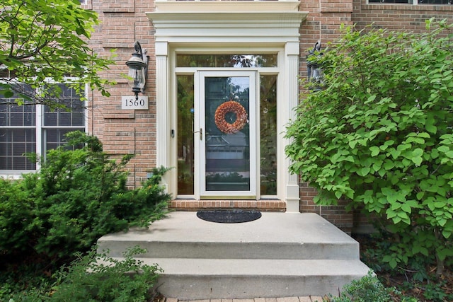 1560 Fairway Cir, Geneva, IL 60134 - view of exterior entry featuring brick siding