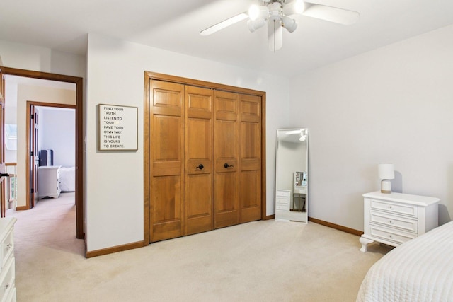1560 Fairway Cir, Geneva, IL 60134 - bedroom featuring light carpet, a closet, and a ceiling fan