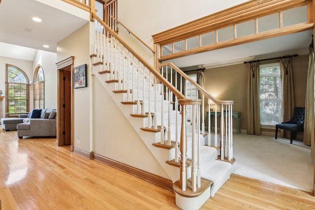 1560 Fairway Cir, Geneva, IL 60134 - stairs featuring healthy amount of natural light, wood finished floors, a high ceiling, and recessed lighting