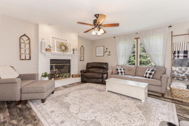 1608 Surrey St, Normal, IL 61761 - living area featuring wood finished floors, ceiling fan, and a fireplace