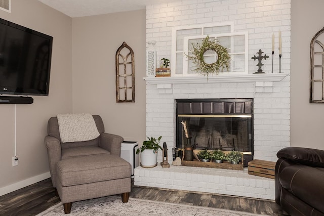 1608 Surrey St, Normal, IL 61761 - living area with wood finished floors and a fireplace
