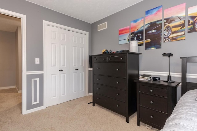 1608 Surrey St, Normal, IL 61761 - bedroom with light carpet and a closet