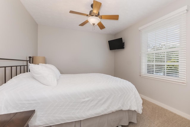 1608 Surrey St, Normal, IL 61761 - carpeted bedroom with multiple windows and a ceiling fan
