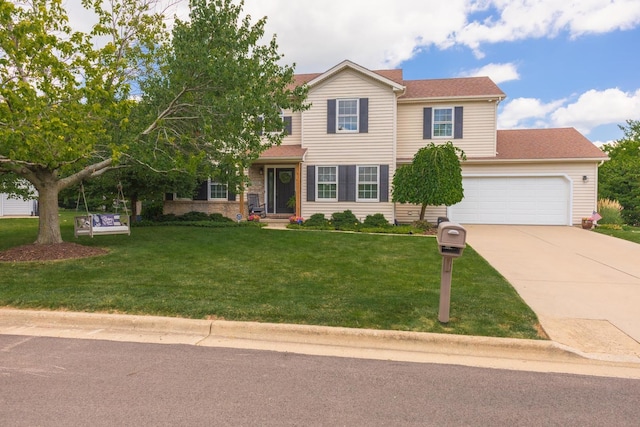 1608 Surrey St, Normal, IL 61761 - view of front of home with concrete driveway, a front lawn, a garage, and a shingled roof