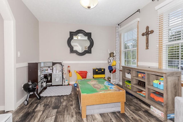 1608 Surrey St, Normal, IL 61761 - playroom featuring wood finished floors and baseboards