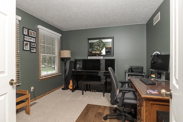 1608 Surrey St, Normal, IL 61761 - carpeted office space featuring a textured ceiling and baseboards