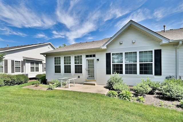 350 Woodhill Dr, Carol Stream, IL 60188 - back of property featuring a lawn, a patio, and a shingled roof