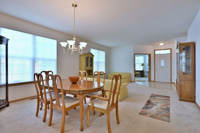 350 Woodhill Dr, Carol Stream, IL 60188 - dining area with a chandelier and light colored carpet