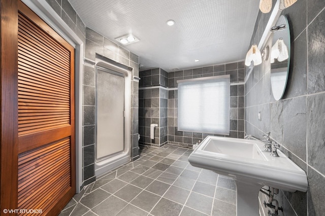 13 Chipping Campden Dr, South Barrington, IL 60010 - full bathroom featuring tile walls, tile patterned flooring, and a stall shower