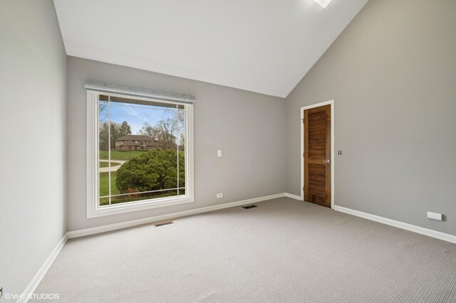 13 Chipping Campden Dr, South Barrington, IL 60010 - carpeted empty room featuring baseboards and vaulted ceiling