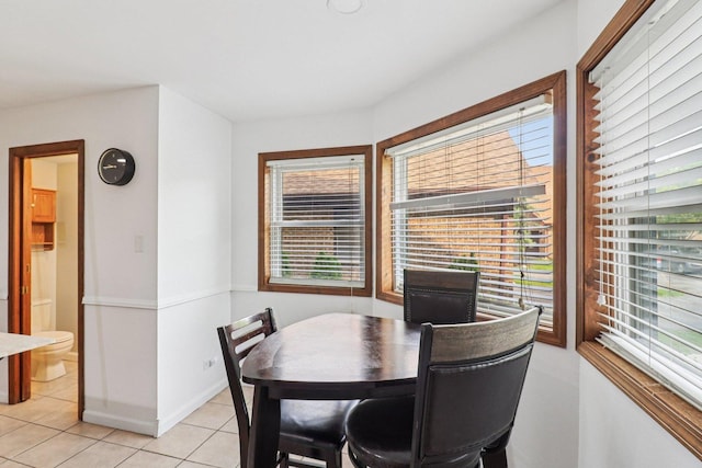 35 Terrace Ln Unit C, Lake Zurich, IL 60047 - dining room featuring light tile patterned floors and baseboards