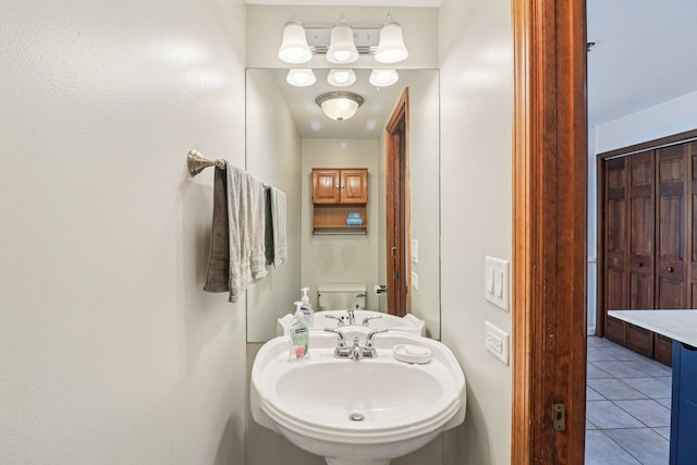 35 Terrace Ln Unit C, Lake Zurich, IL 60047 - half bath featuring tile patterned flooring and a sink