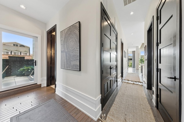 2756 N Magnolia Ave Unit Ph, Chicago, IL 60614 - corridor featuring wood finished floors and plenty of natural light