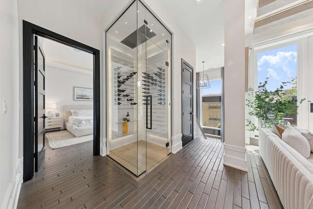 2756 N Magnolia Ave Unit Ph, Chicago, IL 60614 - wine room featuring dark wood-style flooring and baseboards