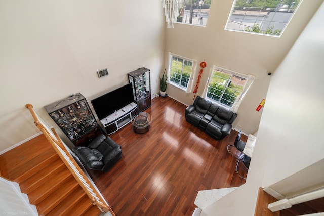 2026 Juniper Ct, Glendale Heights, IL 60139 - living area featuring a towering ceiling and wood finished floors