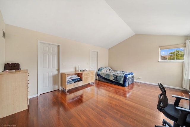2026 Juniper Ct, Glendale Heights, IL 60139 - bedroom featuring dark wood-style flooring, lofted ceiling, and a desk