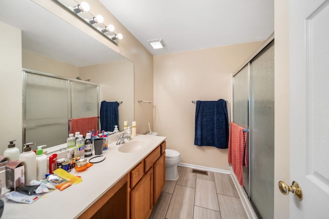 2026 Juniper Ct, Glendale Heights, IL 60139 - bathroom with vanity and an enclosed shower