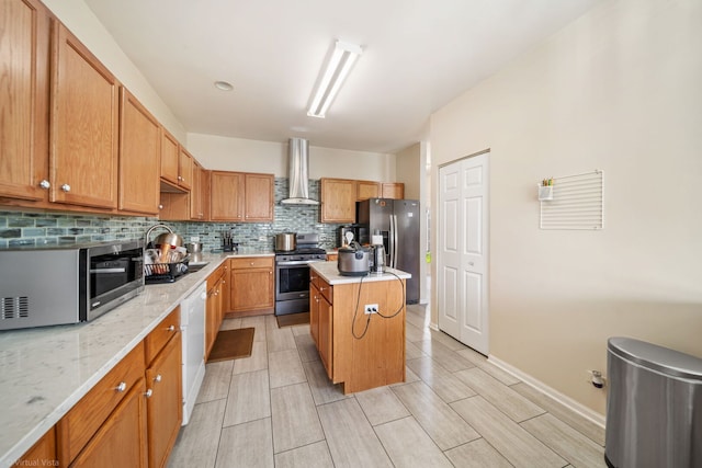 2026 Juniper Ct, Glendale Heights, IL 60139 - kitchen featuring appliances with stainless steel finishes, wall chimney range hood, backsplash, a center island, and light stone counters
