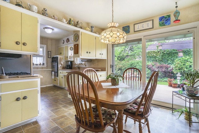16524 Shirley Ct, South Holland, IL 60473 - dining room with stone tile flooring and a chandelier
