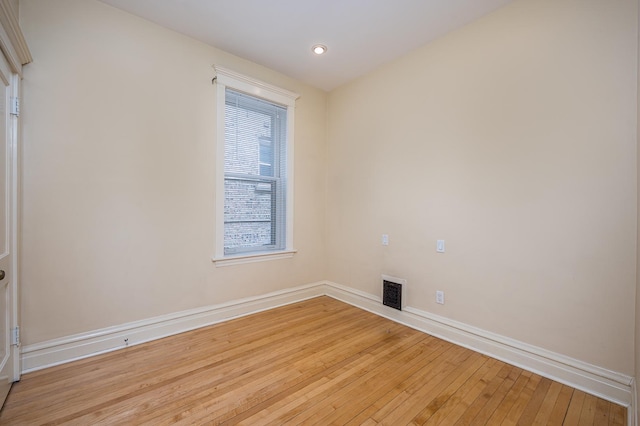 2115 N Sawyer Ave, Chicago, IL 60647 - spare room with light wood-type flooring and recessed lighting