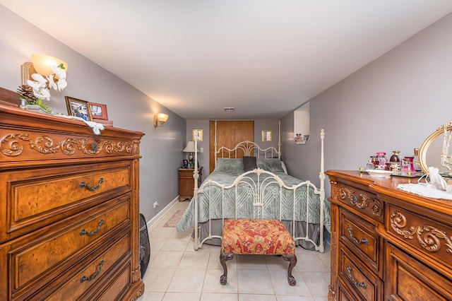 2115 N Sawyer Ave, Chicago, IL 60647 - bedroom featuring light tile patterned floors