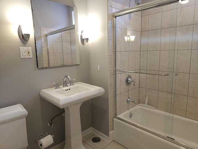2115 N Sawyer Ave, Chicago, IL 60647 - bathroom with enclosed tub / shower combo and tile patterned floors