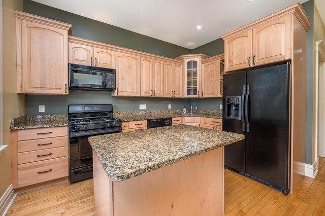 2115 N Sawyer Ave, Chicago, IL 60647 - kitchen featuring black appliances, light brown cabinetry, light wood-style flooring, and recessed lighting