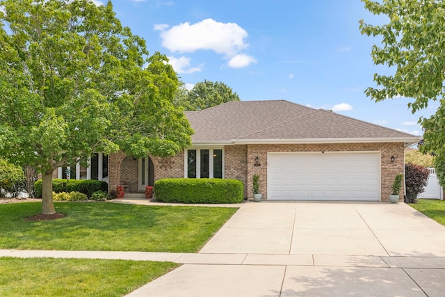 15431 Sulky Dr, Homer Glen, IL 60491 - view of front facade with a front lawn, an attached garage, concrete driveway, and brick siding