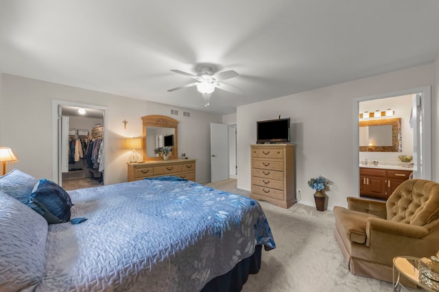 15431 Sulky Dr, Homer Glen, IL 60491 - bedroom featuring light carpet, a spacious closet, ceiling fan, ensuite bathroom, and a closet