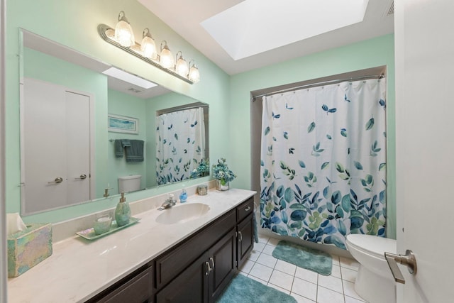 15431 Sulky Dr, Homer Glen, IL 60491 - bathroom featuring a skylight, tile patterned floors, vanity, and a shower with shower curtain