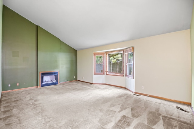 528 Carlson Ct, Batavia, IL 60510 - unfurnished living room featuring a fireplace, carpet floors, and high vaulted ceiling