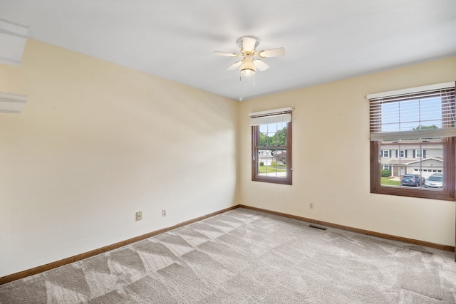 528 Carlson Ct, Batavia, IL 60510 - spare room with a ceiling fan and light carpet