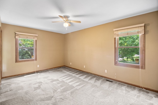 528 Carlson Ct, Batavia, IL 60510 - carpeted empty room with a ceiling fan and baseboards
