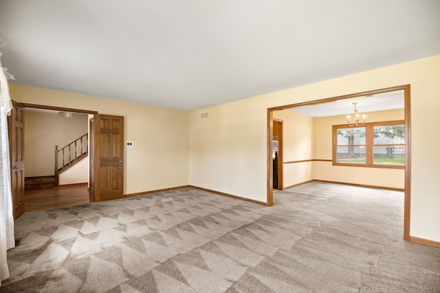 528 Carlson Ct, Batavia, IL 60510 - unfurnished room featuring a chandelier, stairs, and light carpet