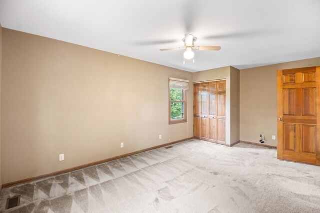 528 Carlson Ct, Batavia, IL 60510 - unfurnished bedroom with light carpet, a ceiling fan, and a closet