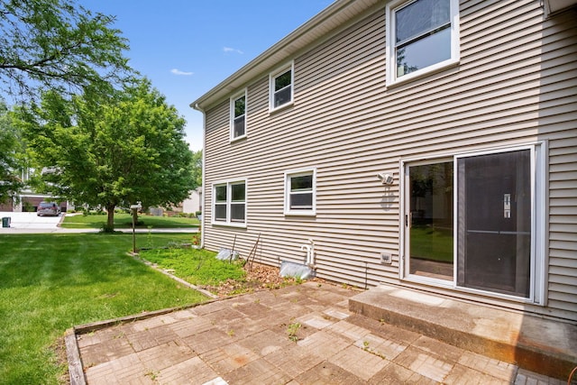 528 Carlson Ct, Batavia, IL 60510 - back of house with a patio and a lawn