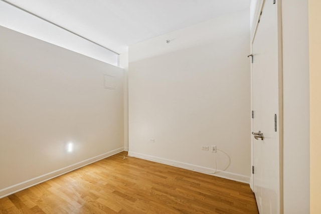 310 S Michigan Ave Unit 1804, Chicago, IL 60604 - spare room featuring light wood-style floors and baseboards