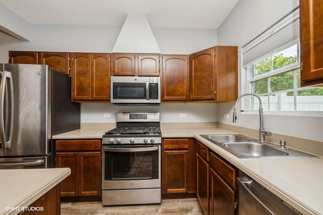2733 Kendall Xing, Johnsburg, IL 60051 - kitchen featuring stainless steel appliances, light countertops, and light wood-style flooring