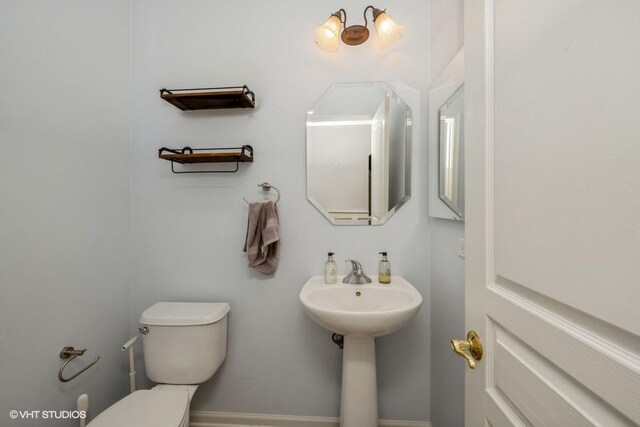 2733 Kendall Xing, Johnsburg, IL 60051 - bathroom featuring toilet and baseboards