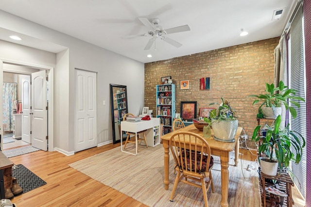 1639 W Farwell Ave Unit 1, Chicago, IL 60626 - dining area featuring brick wall, wood finished floors, ceiling fan, and recessed lighting