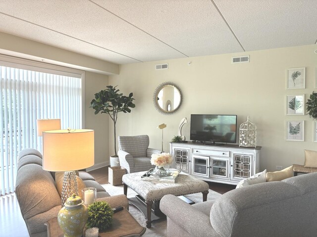 50 S Greeley St Unit 314, Palatine, IL 60067 - living area with wood finished floors and a textured ceiling