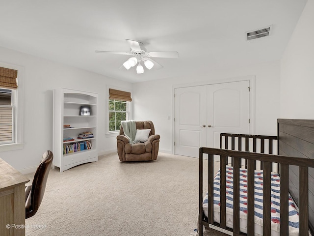 551 W 3rd St, Elmhurst, IL 60126 - carpeted bedroom featuring a ceiling fan and a closet