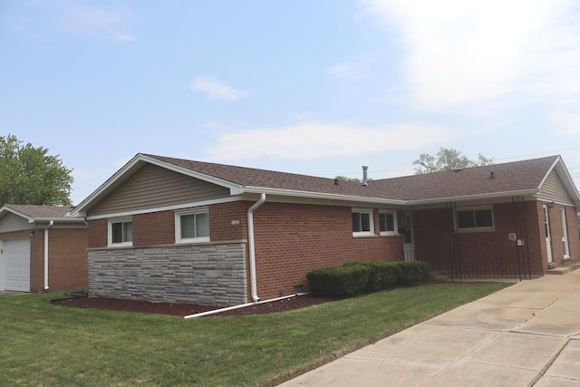 15153 Harding Ave, Midlothian, IL 60445 - view of front of home featuring a front yard, brick siding, stone siding, and a shingled roof