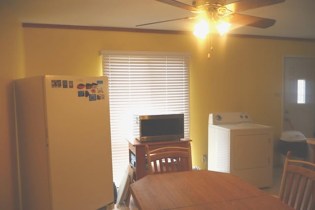 15153 Harding Ave, Midlothian, IL 60445 - dining room featuring washer / clothes dryer and ceiling fan