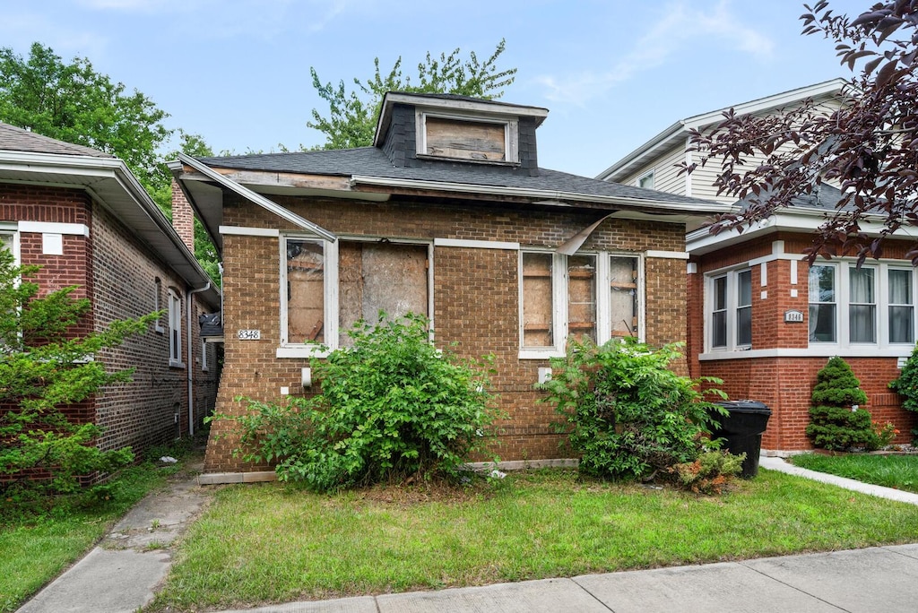 8348 S Oglesby Ave, Chicago, IL 60617 - bungalow with brick siding