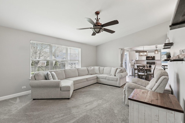 11176 Fleetwood St, Huntley, IL 60142 - living room featuring lofted ceiling, a ceiling fan, and carpet floors